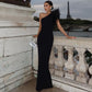 Vestido negro asimétrico plumas